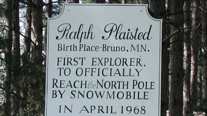 A sign commemorates Ralph Plaisted's singular polar achievement in Bruno, Minnesota.