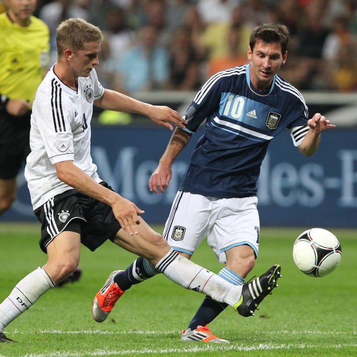 Germany's midfielder Lars Bender (L) vie