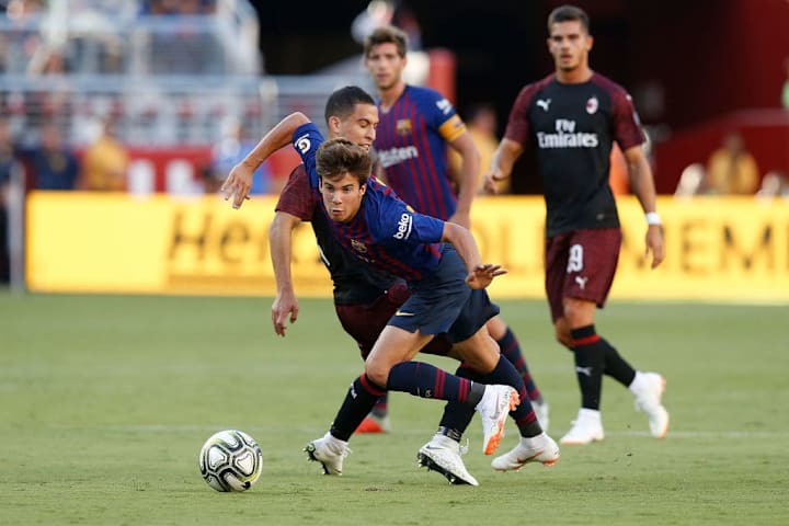 Riqui Puig face au Milan AC en 2018. 