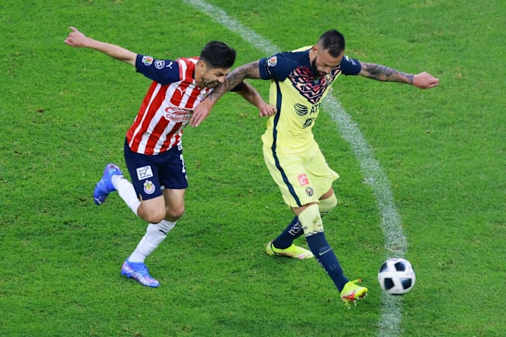 Oribe Peralta, Victor Aguilera