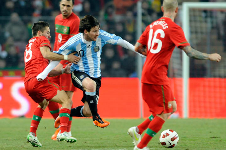 Argentinian Leo Messi fight for the ball