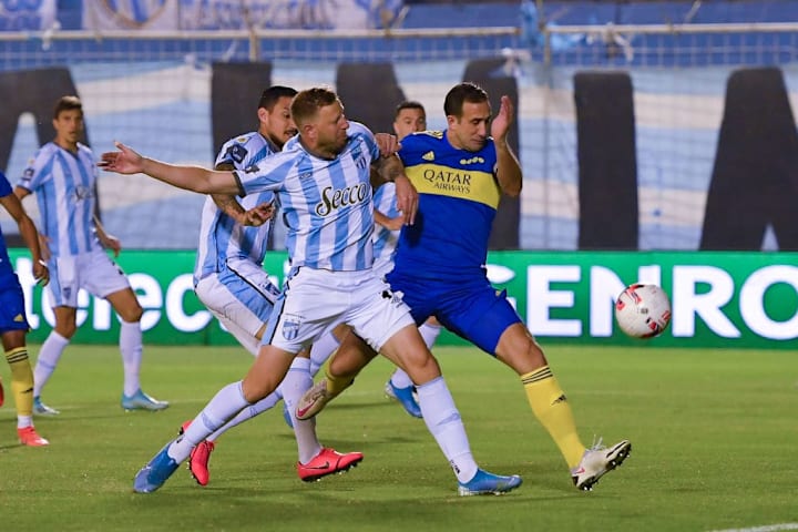 Cristian Menéndez, Carlos Izquierdoz
