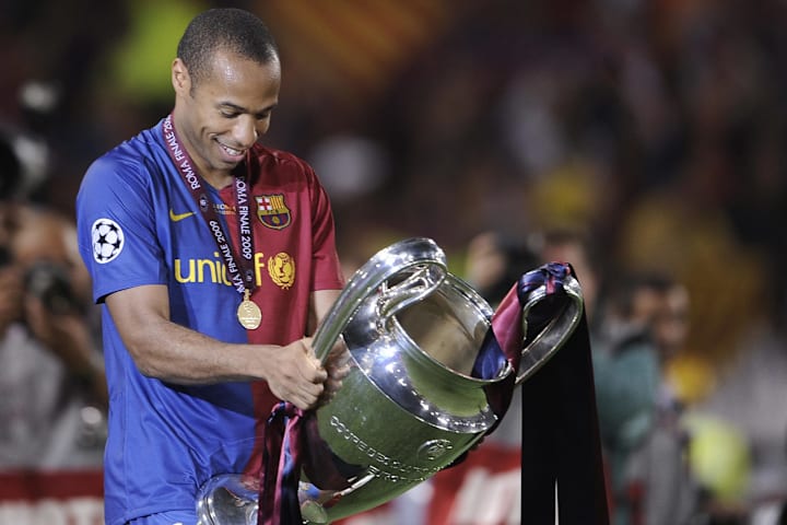 Barcelona's Thierry Henry celebrates wit