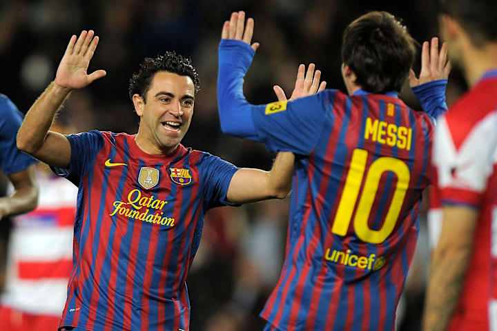 Messi con Xavi