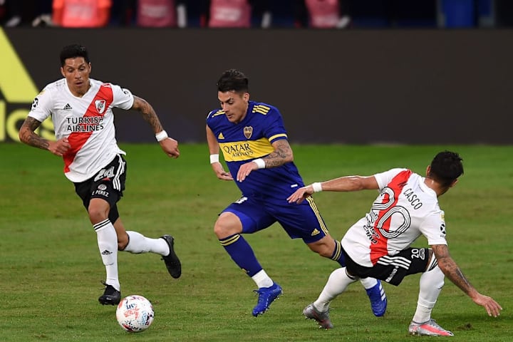 Cristian Pavón, Enzo Pérez, Milton Casco