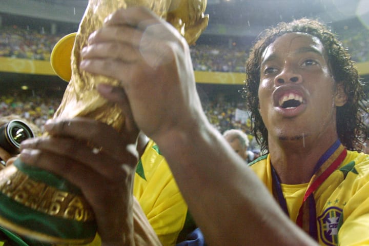 Brazil's midfielder Ronaldinho celebrate