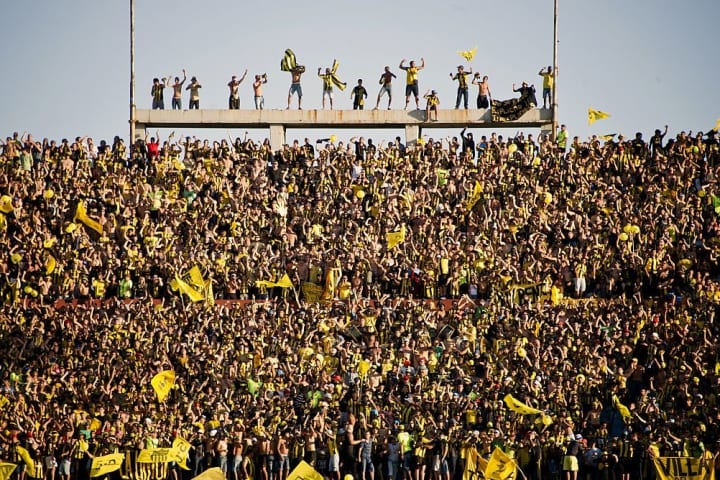 Estadio Centenario with a sea of yellow shirts