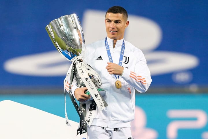 Juventus's Portuguese striker Cristiano Ronaldo holds the...