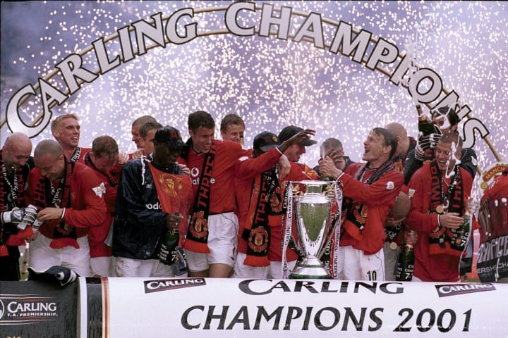 Sheringham celebrates his third Premier League title with Manchester United