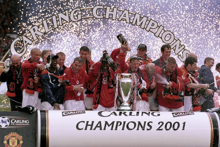 Manchester United completed a hat-trick of Premier League titles in 2001