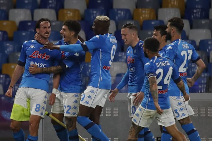 Napoli's Spanish midfielder Fabian Ruiz (L) celebrates with...