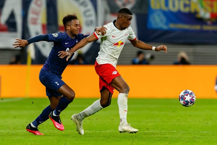 Sessegnon battling RB Leipzig's Nordi Mukiele for possession in one of his rare starts under Jose Mourinho