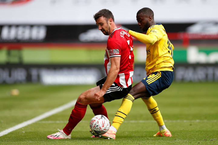 Pepe battles Enda Stevens for possession