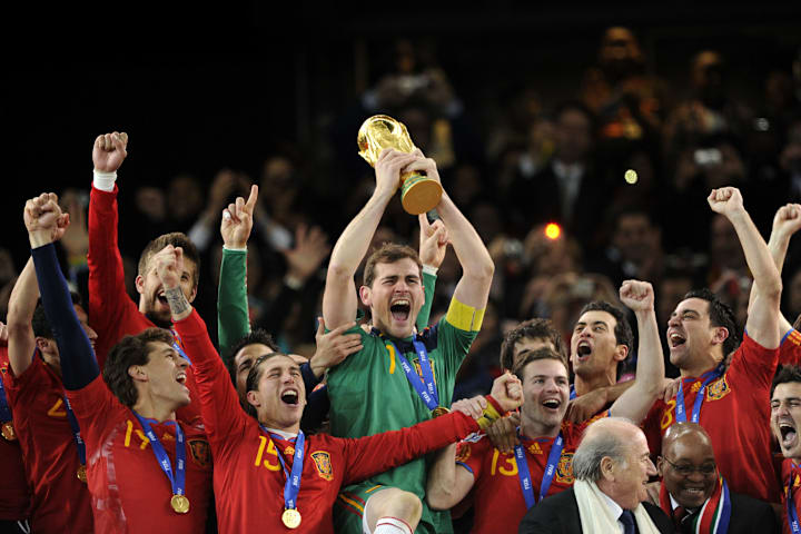 Iker Casillas (centre) captained Spain to all three international triumphs between 2008 and 2012