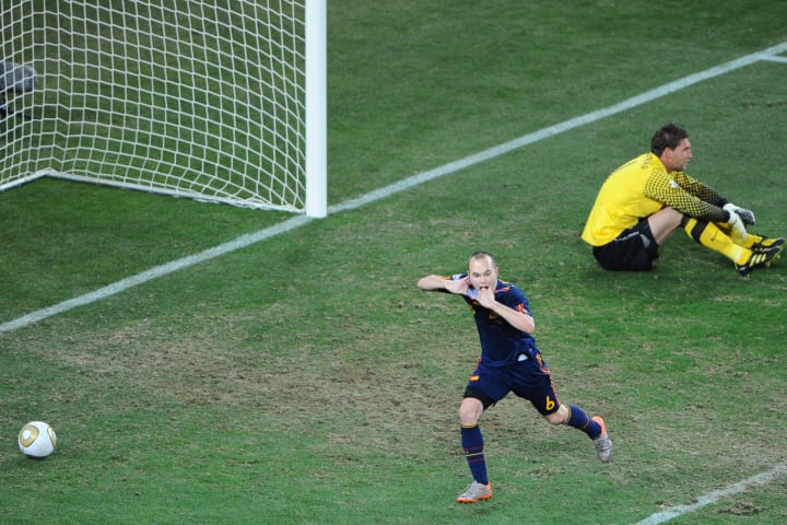 Iniesta celebrates his extra-time winner against Netherlands
