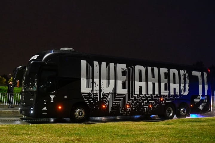 The bus transporting Juventus' players arrives at the...