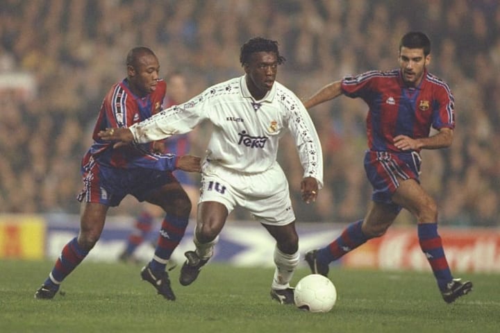 (left-right)  Amunike of Barcelona Clarence Seedorf of Real and Guardiola of Barcelona challenge for
