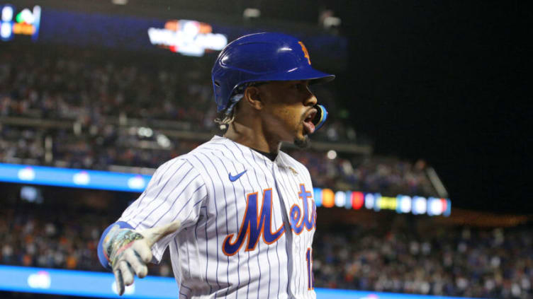 Oct 8, 2022; New York City, New York, USA; New York Mets shortstop Francisco Lindor (12) reacts after hitting a solo home run in the first inning during game two of the Wild Card series against the San Diego Padres for the 2022 MLB Playoffs at Citi Field. Mandatory Credit: Brad Penner-USA TODAY Sports