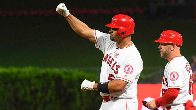 ANAHEIM, CA - AUGUST 30: Los Angeles Angels first baseman Albert Pujols (5) celebrates a two rbi single during a MLB game between the Boston Red Sox and the Los Angeles Angels of Anaheim on August 30, 2019 at Angel Stadium of Anaheim in Anaheim, CA. (Photo by Brian Rothmuller/Icon Sportswire via Getty Images)