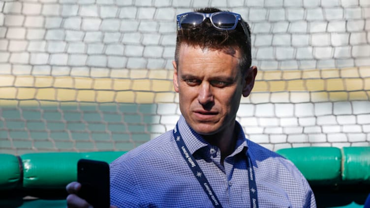 Jun 15, 2018; Seattle, WA, USA; Seattle Mariners general manager Jerry Dipoto checks his phone during batting practice against the Boston Red Sox at Safeco Field. Mandatory Credit: Joe Nicholson-USA TODAY Sports