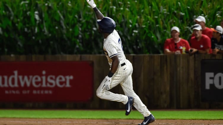 Aug 12, 2021; Dyersville, Iowa, USA; Chicago White Sox shortstop Tim Anderson (7) reacts after hitting a two-run home run in the ninth inning to defeat the New York Yankees at Field of Dreams. Mandatory Credit: Jeffrey Becker-USA TODAY Sports