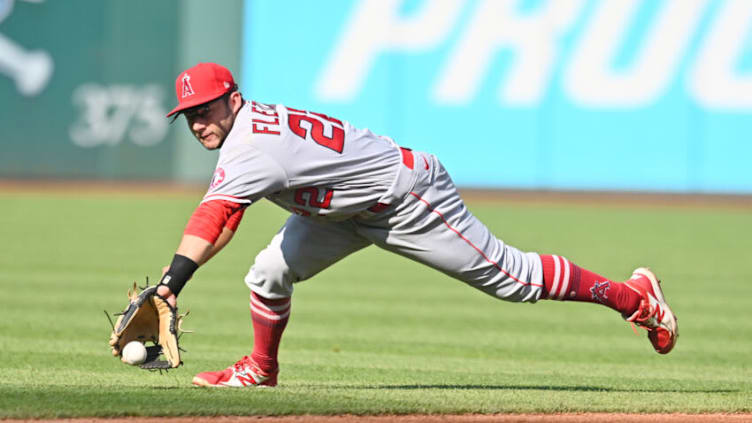 Aug 21, 2021; Cleveland, Ohio, USA; Los Angeles Angels second baseman David Fletcher (22) fields a ball hit by Cleveland Indians first baseman Owen Miller (6) during the third inning at Progressive Field. Miller was safe on the play. Mandatory Credit: Ken Blaze-USA TODAY Sports