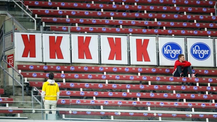 CINCINNATI, OH - APRIL 23: General view as a single fan and security guard sit in an empty section of seats where strike outs are displayed during a game between the Atlanta Braves and Cincinnati Reds at Great American Ball Park on April 23, 2018 in Cincinnati, Ohio. The Reds won 10-4. (Photo by Joe Robbins/Getty Images) *** Local Caption ***