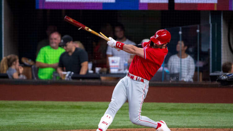 Jun 22, 2022; Arlington, Texas, USA; Philadelphia Phillies designated hitter Bryce Harper (3) hits a single against the Texas Rangers during the sixth inning at Globe Life Field. Mandatory Credit: Jerome Miron-USA TODAY Sports