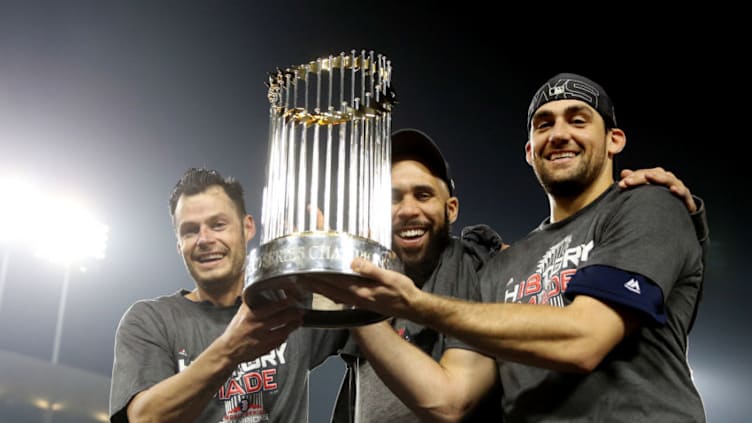 LOS ANGELES, CA - OCTOBER 28: Joe Kelly #56, David Price #24 and Nathan Eovaldi #17 of the Boston Red Sox pose for a photo with the Commissioner's Trophy after the Red Sox defeated the Los Angeles Dodgers in Game 5 of the 2018 World Series at Dodger Stadium on Sunday, October 28, 2018 in Los Angeles, California. (Photo by Rob Tringali/MLB Photos via Getty Images)