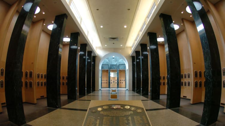 Plaques in the main hallway identify inductee classes in the Baseball Hall of Fame and Museum July 25, 2004 in Cooperstown, New York. (Photo by A. Messerschmidt/Getty Images) *** Local Caption ***