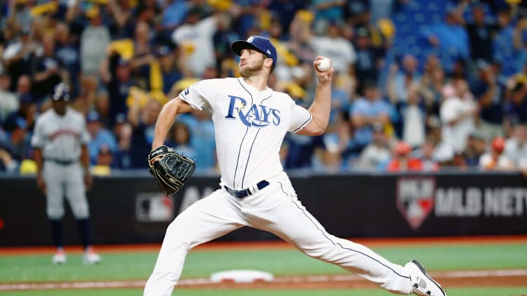 Oct 7, 2019; St. Petersburg, FL, USA; Tampa Bay Rays relief pitcher Colin Poche (38) pitches against the Houston Astros during the ninth inning in game three of the 2019 ALDS playoff baseball series at Tropicana Field. The Tampa Bay Rays won 10-3. Mandatory Credit: Kim Klement-USA TODAY Sports