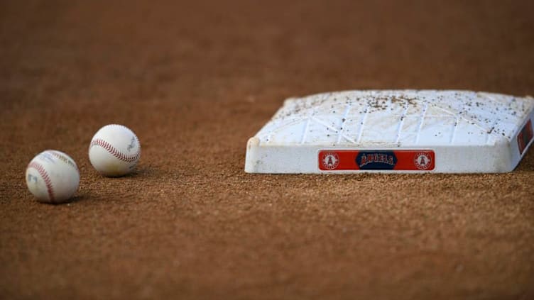 ANAHEIM, CA - SEPTEMBER 27: Practice balls on the infield before the Los Angeles Angels play the Houston Astros at Angel Stadium of Anaheim on September 27, 2019 in Anaheim, California. (Photo by John McCoy/Getty Images)