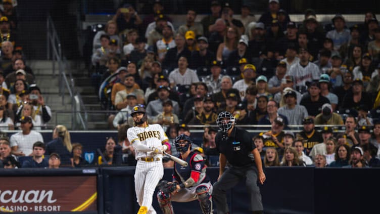 SAN DIEGO, CA - JULY 5: Fernando Tatis Jr #23 of the San Diego Padres hits a home run in the fourth inning against the Washington Nationals on July 5, 2021 at Petco Park in San Diego, California. (Photo by Matt Thomas/San Diego Padres/Getty Images)