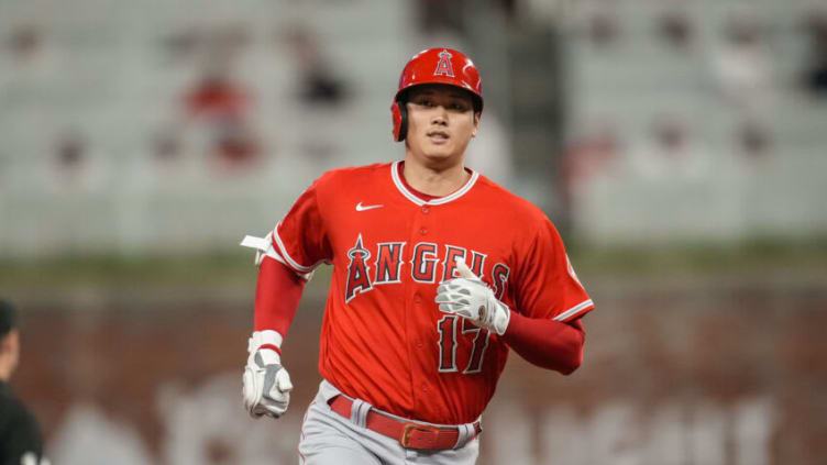 Jul 23, 2022; Cumberland, Georgia, USA; Los Angeles Angels designated hitter Shohei Ohtani (17) runs after hitting a home run against the Atlanta Braves during the fifth inning at Truist Park. Mandatory Credit: Dale Zanine-USA TODAY Sports