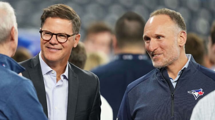 Apr 11, 2023; Toronto, Ontario, CAN; Toronto Blue Jays General Manager Ross Atkins and Toronto Blue Jays President Mark Shapiro talk with the media during batting practice against the Detroit Tigers at the Rogers Centre. Mandatory Credit: Nick Turchiaro-USA TODAY Sports