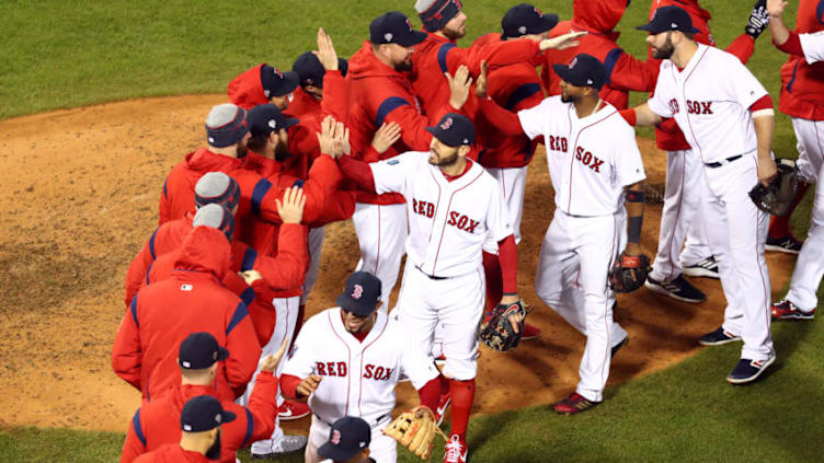 BOSTON, MA - OCTOBER 23: The Boston Red Sox celebrate after an 8-4 win against the Los Angeles Dodgers in Game 1 of the 2018 World Series at Fenway Park on Tuesday, October 23, 2018 in Boston, Massachusetts. (Photo by Adam Glanzman/MLB Photos via Getty Images)