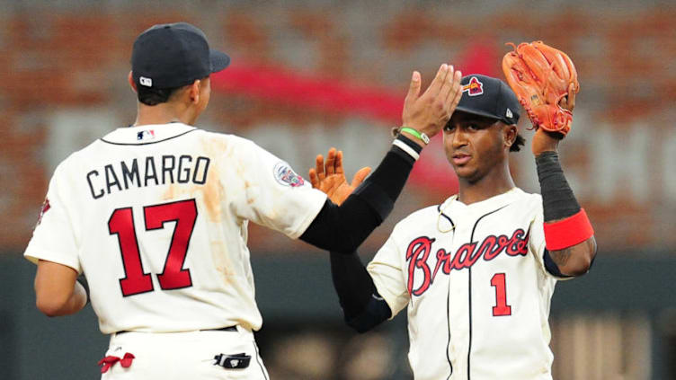 ATLANTA, GA - AUGUST 5: Johan Camargo #17 and Ozzie Albies #1 of the Atlanta Braves celebrate after the game against the Miami Marlins at SunTrust Park on August 5, 2017 in Atlanta, Georgia. (Photo by Scott Cunningham/Getty Images)