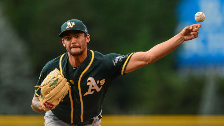 DENVER, CO - JULY 27: Sean Manaea #55 of the Oakland Athletics pitches against the Colorado Rockies in the first inning during interleague play at Coors Field on July 27, 2018 in Denver, Colorado. (Photo by Dustin Bradford/Getty Images)