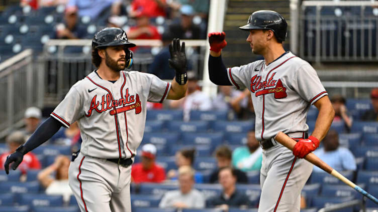 Jul 14, 2022; Washington, District of Columbia, USA; Atlanta Braves shortstop Dansby Swanson (7) is congratulated by first baseman Matt Olson (28) after hitting a two run home run against the Washington Nationals during the first inning at Nationals Park. Mandatory Credit: Brad Mills-USA TODAY Sports