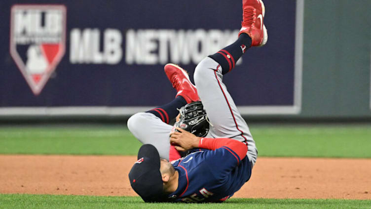 Sep 21, 2022; Kansas City, Missouri, USA; Minnesota Twins shortstop Carlos Correa (4) reacts after having the ball ricochet off him during the seventh inning against the Kansas City Royals at Kauffman Stadium. Mandatory Credit: Peter Aiken-USA TODAY Sports