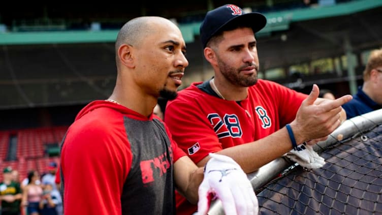 BOSTON, MA - JULY 28: Mookie Betts #50 talks with J.D. Martinez #28 of the Boston Red Sox before a game against the New York Yankees on July 28, 2019 at Fenway Park in Boston, Massachusetts. (Photo by Billie Weiss/Boston Red Sox/Getty Images)