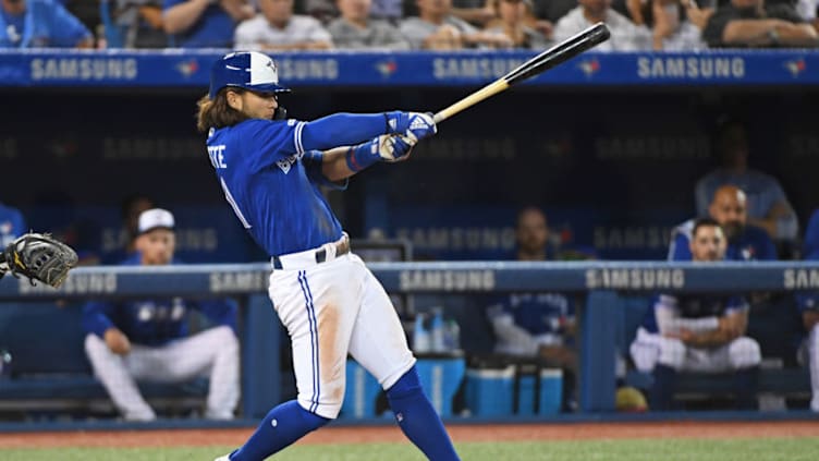 TORONTO, ON - AUGUST 08: Toronto Blue Jays Infield Bo Bichette (11) hits a RBI double in the sixth inning during the regular season MLB game between the New York Yankees and Toronto Blue Jays on August 8, 2019 at Rogers Centre in Toronto, ON. (Photo by Gerry Angus/Icon Sportswire via Getty Images)