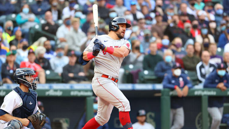 SEATTLE, WASHINGTON - SEPTEMBER 15: Kyle Schwarber #18 of the Boston Red Sox hits a two-run single against the Seattle Mariners during the tenth inning at T-Mobile Park on September 15, 2021 in Seattle, Washington. (Photo by Abbie Parr/Getty Images)