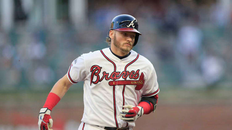 ATLANTA, GA - OCTOBER 09: Atlanta Braves third baseman Josh Donaldson #20 rounds the bases after hitting a home run the fifth and final game of the National League Division Series between the Atlanta Braves and the St. Louis Cardinals on October 9, 2019 at Suntrust Park in Atlanta, Georgia. (Photo by David J. Griffin/Icon Sportswire via Getty Images)