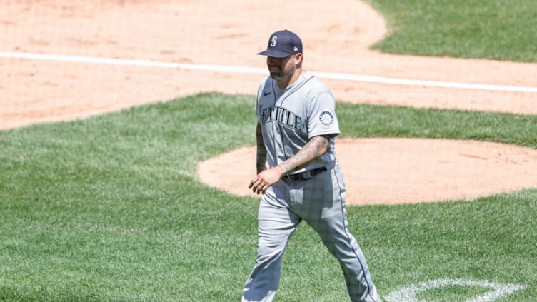 Jun 27, 2021; Chicago, Illinois, USA; Seattle Mariners relief pitcher Hector Santiago (57) is ejected from a baseball game against the Chicago White Sox after illegal substance was found in his glove during the fifth inning of the first game of a doubleheader at Guaranteed Rate Field. Mandatory Credit: Kamil Krzaczynski-USA TODAY Sports