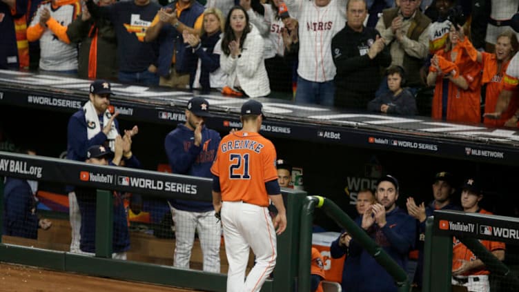 HOUSTON, TEXAS - OCTOBER 30: Zack Greinke #21 of the Houston Astros is taken out of the game against the Washington Nationals during the seventh inning in Game Seven of the 2019 World Series at Minute Maid Park on October 30, 2019 in Houston, Texas. (Photo by Bob Levey/Getty Images)