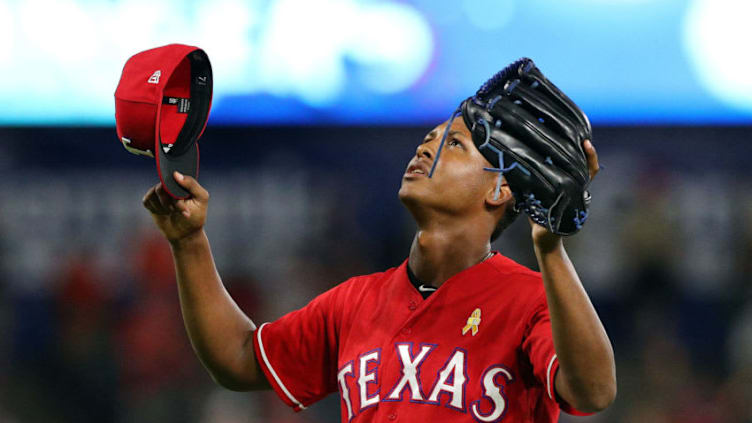 ARLINGTON, TX - SEPTEMBER 01: Jose Leclerc #62 of the Texas Rangers gestures after striking out Tyler Austin of the Minnesota Twins for the final out of the game at Globe Life Park in Arlington on September 1, 2018 in Arlington, Texas. (Photo by Richard Rodriguez/Getty Images)