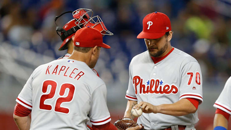 MIAMI, FL - SEPTEMBER 03: Luis Avilan #70 of the Philadelphia Phillies is taken out of the game by manager Gabe Kapler #22 against the Miami Marlins at Marlins Park on September 3, 2018 in Miami, Florida. (Photo by Michael Reaves/Getty Images)