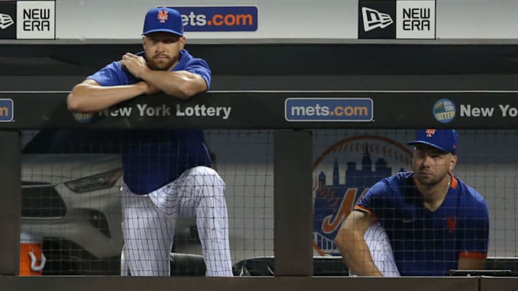 Aug 15, 2021; New York City, New York, USA; New York Mets injured starting pitcher Jacob deGrom (48) watches from the dugout during the sixth inning against the Los Angeles Dodgers at Citi Field. Mandatory Credit: Brad Penner-USA TODAY Sports