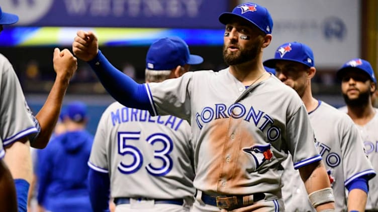 ST PETERSBURG, FL - SEPTEMBER 28: Kevin Pillar #11 of the Toronto Blue Jays celebrates with teammates after beating the Tampa Bay Rays 7-6 on September 28, 2018 at Tropicana Field in St Petersburg, Florida. (Photo by Julio Aguilar/Getty Images)